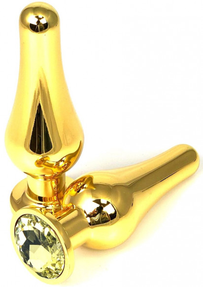 Золотистая удлиненная анальная пробка с желтым кристаллом - 10 см. Золотистая удлиненная анальная пробка с желтым кристаллом - 10 см.