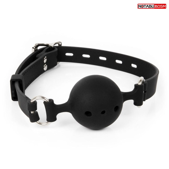 Черный силиконовый кляп-шарик с отверстиями на регулируемом ремешке Черный силиконовый кляп-шарик с отверстиями на регулируемом ремешке